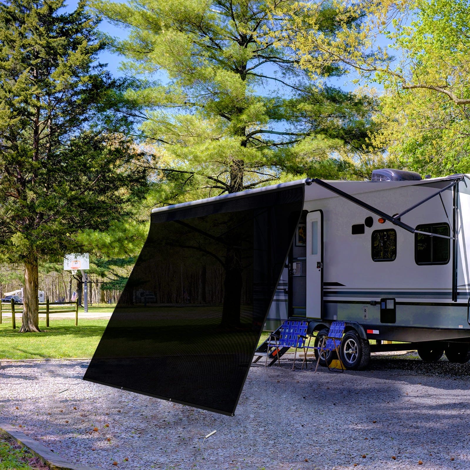Accessory image for the WELKIN Front RV Awning Sun Shade Screen (A3101) installed on an RV, demonstrating the shading effect on the campsite area outside the vehicle.